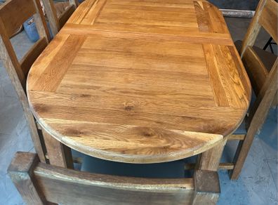 solid oak table and 6 chairs