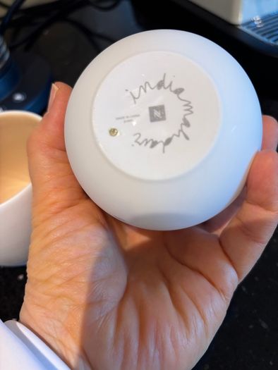 Nespresso espresso machine, milk frother and cups