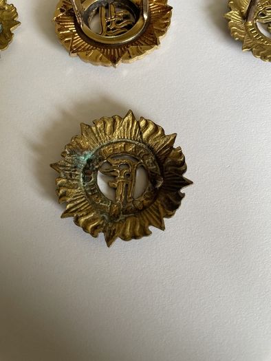 Irish Army cap badges three brass one staybrite