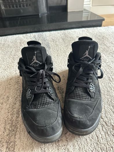 Black Cat Jordan 4s