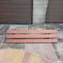 Wall mounted outdoor plastic composite bench with a rust resistant frame Image 2