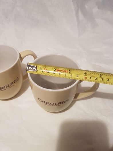 2 x new Carolans irish cream mugs ,never used ,,collectors item,,advertising,buyer collects, not posting, thank you