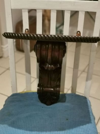 Old hand carved wall sconce