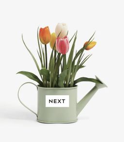 Artificial Flowers in Metal Watering Can