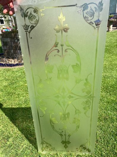 Acid etched glass panel