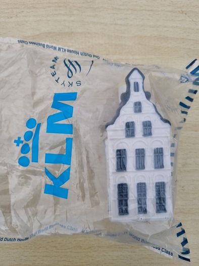 A miniature of a Dutch house from the KLM Delft Blue Houses series
