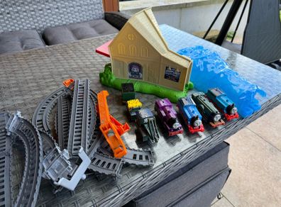 Thomas the tank engine trains and track pieces