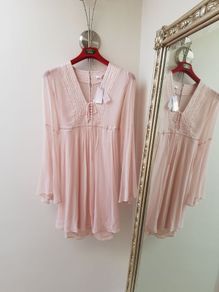 Ghost dress Mixing vintage aesthetics with contemporary silhouettes, the London-based label uses a special garment dyeing process to gives its clothing a dreamy, crinkled texture