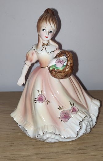 Vintage Porcelain Girl with flower basket Figurine