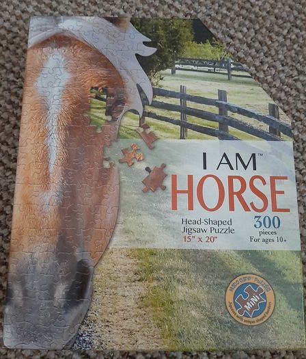 Brand new jigsaw in the shape of a horse's head