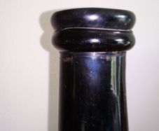 Black Glass Hand Blown Sauce Bottle.
