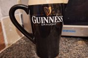 Guinness pub jug. This is a lovely black and white Guinness pub jug designed to resemble a creamy pint of the black stuff