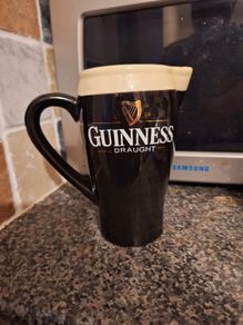 Guinness pub jug. This is a lovely black and white Guinness pub jug designed to resemble a creamy pint of the black stuff