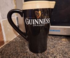 Guinness pub jug. This is a lovely black and white Guinness pub jug designed to resemble a creamy pint of the black stuff