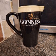 Guinness pub jug. This is a lovely black and white Guinness pub jug designed to resemble a creamy pint of the black stuff