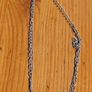 This matching silver-tone crystal necklace and bracelet set features alternating clear and black round stations with textured bezels.  SEE PHOTOS FOR SAME. Image 6