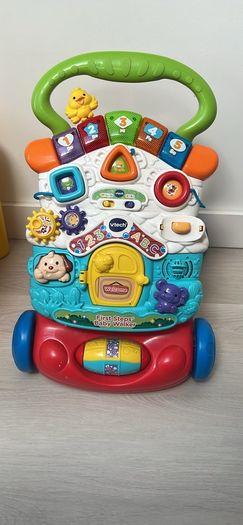 Adjustable baby safety gate and Vtech walker