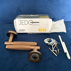 Rose gold Lever on Rose knurled door handle