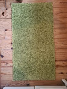 2 green rugs