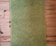 2 green rugs