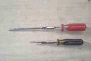 Screw holding screwdrivers