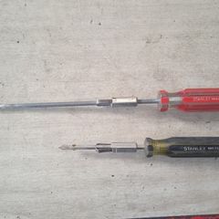 Screw holding screwdrivers