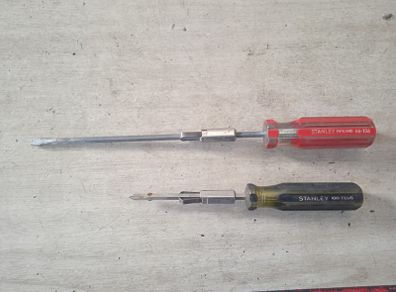 Screw holding screwdrivers