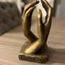 Bronze Cathedral Hands Statue Image 2