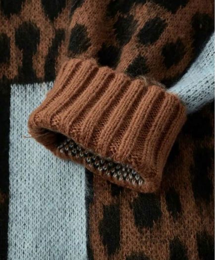 Ribbed lose leopard print polo neck jumper