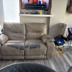 Grey 2 seater faux leather couch with recline
