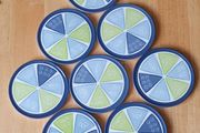 New - A Set of 8 Coasters - E