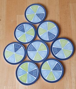 New - A Set of 8 Coasters - E