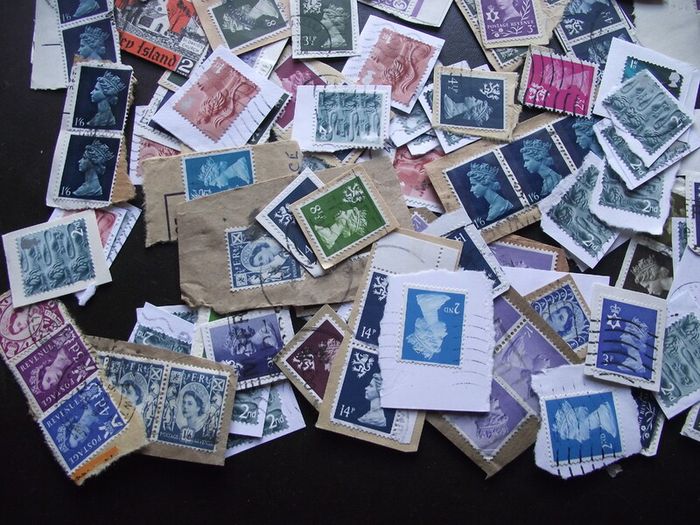 A box with collection of stamps from Great Britain