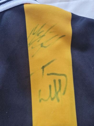 Signed kilkenny child's Jersey no clue what signatures on it in good condition