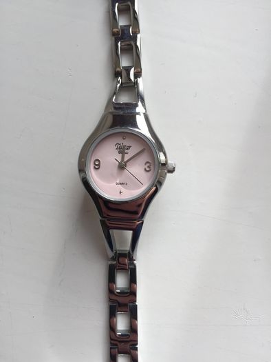 Telstar Quartz ladies silver watch with pink face- working perfectly new battery added.