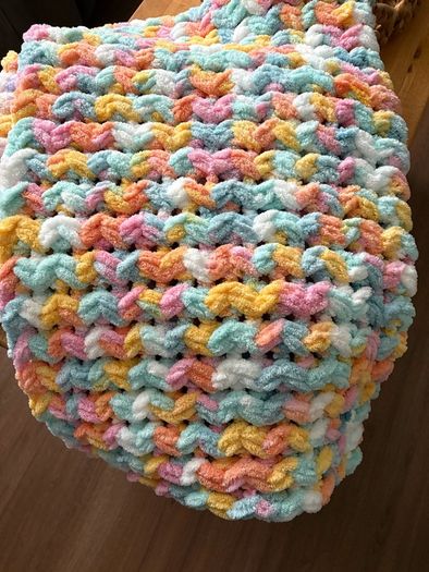 hand knitted baby blankets and cardigans