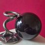 Obsidian glass ball and metal Serpent stand. Image 5