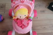 Baby walker with doll