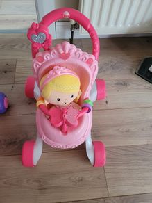 Baby walker with doll