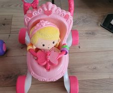 Baby walker with doll
