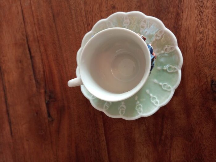 Victorian Remember Me Ceramic Tea cup and saucer.