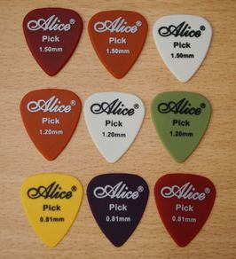 Guitar Picks/Plectrums Set of 9 Medium/Heavy Free Postage