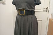 Dress with an asymmetrical neckline