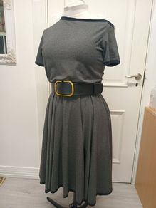 Dress with an asymmetrical neckline