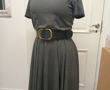Dress with an asymmetrical neckline