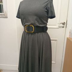 Dress with an asymmetrical neckline