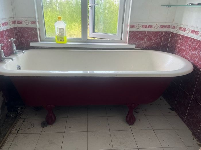 cast iron bath in ornate feet.