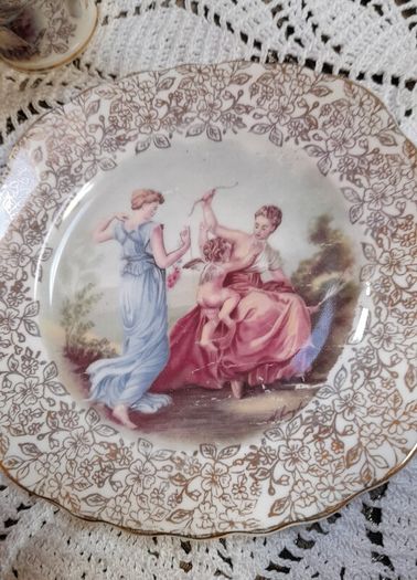 An antique  Aynsley tea trio