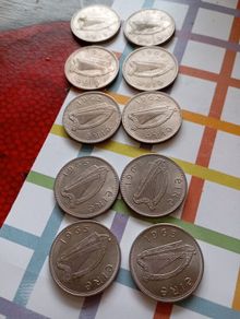 mint 2 shilling coins.   various dates