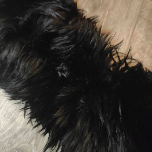 Black fur collar and extra piece of the same fur